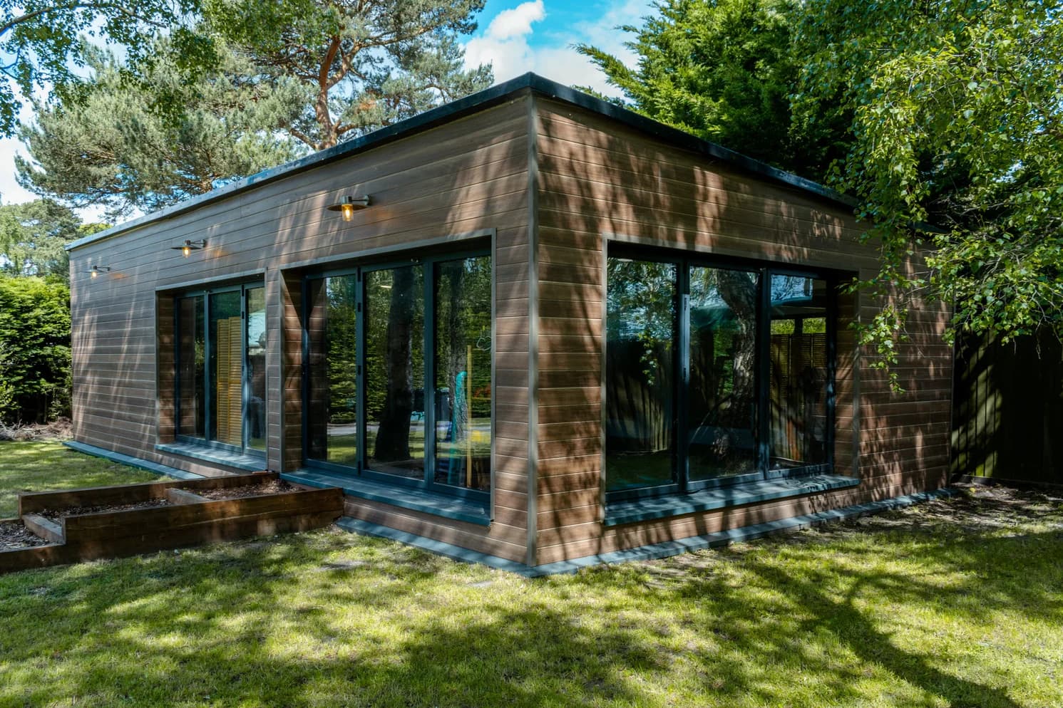 Modern timber garden room with glass frontage